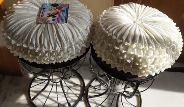 Round Off White with white pearl smocking cushion