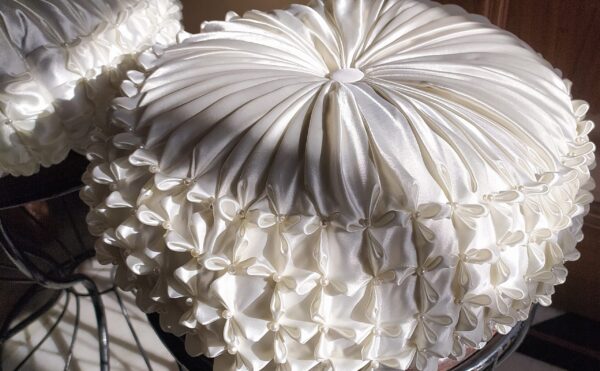 Round Off White with white pearl smocking cushion