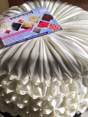 Round Off White with white pearl smocking cushion