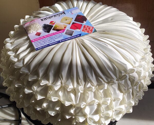 Round Off White with white pearl smocking cushion